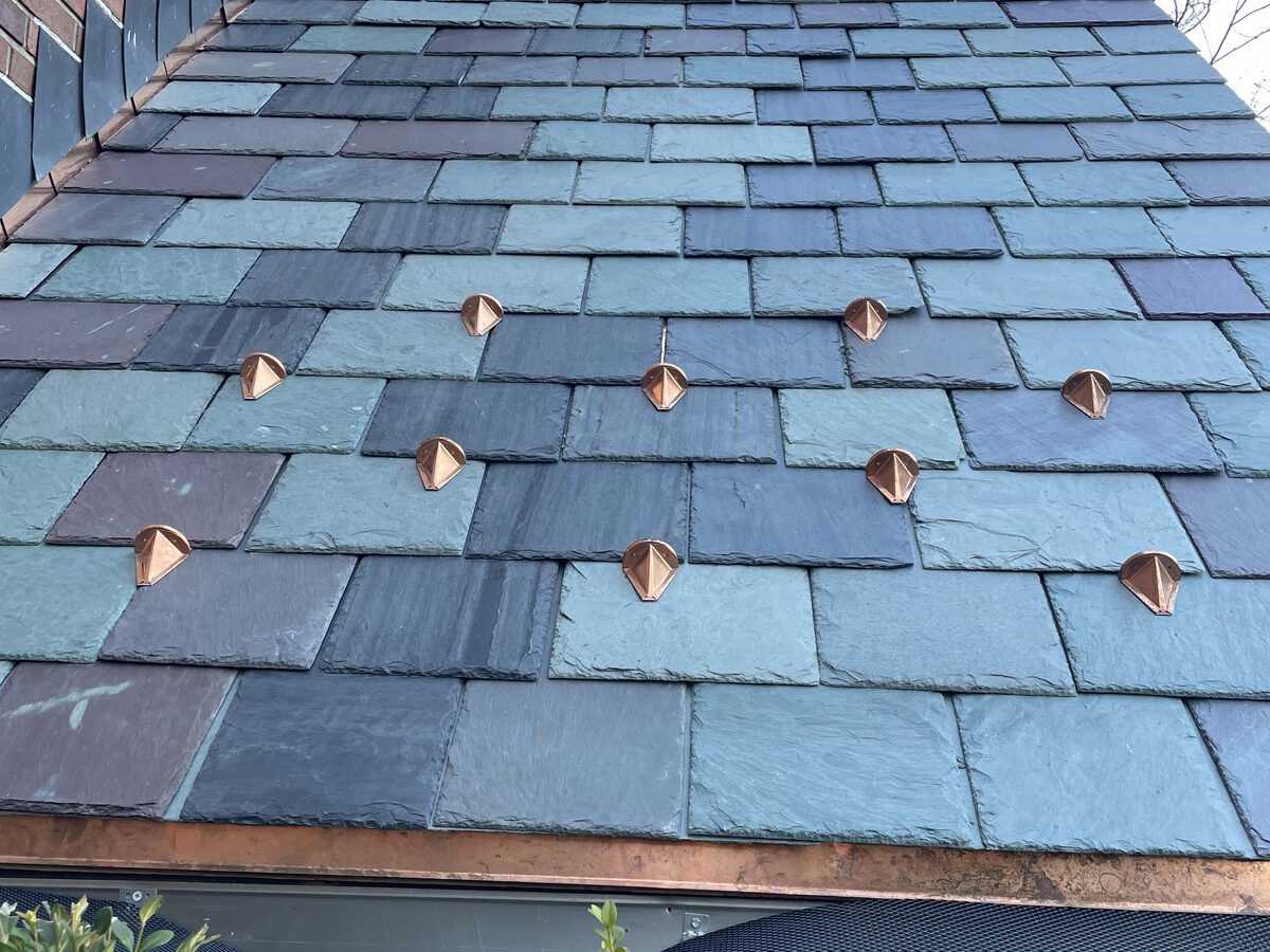 Natural slate with copper snow guards