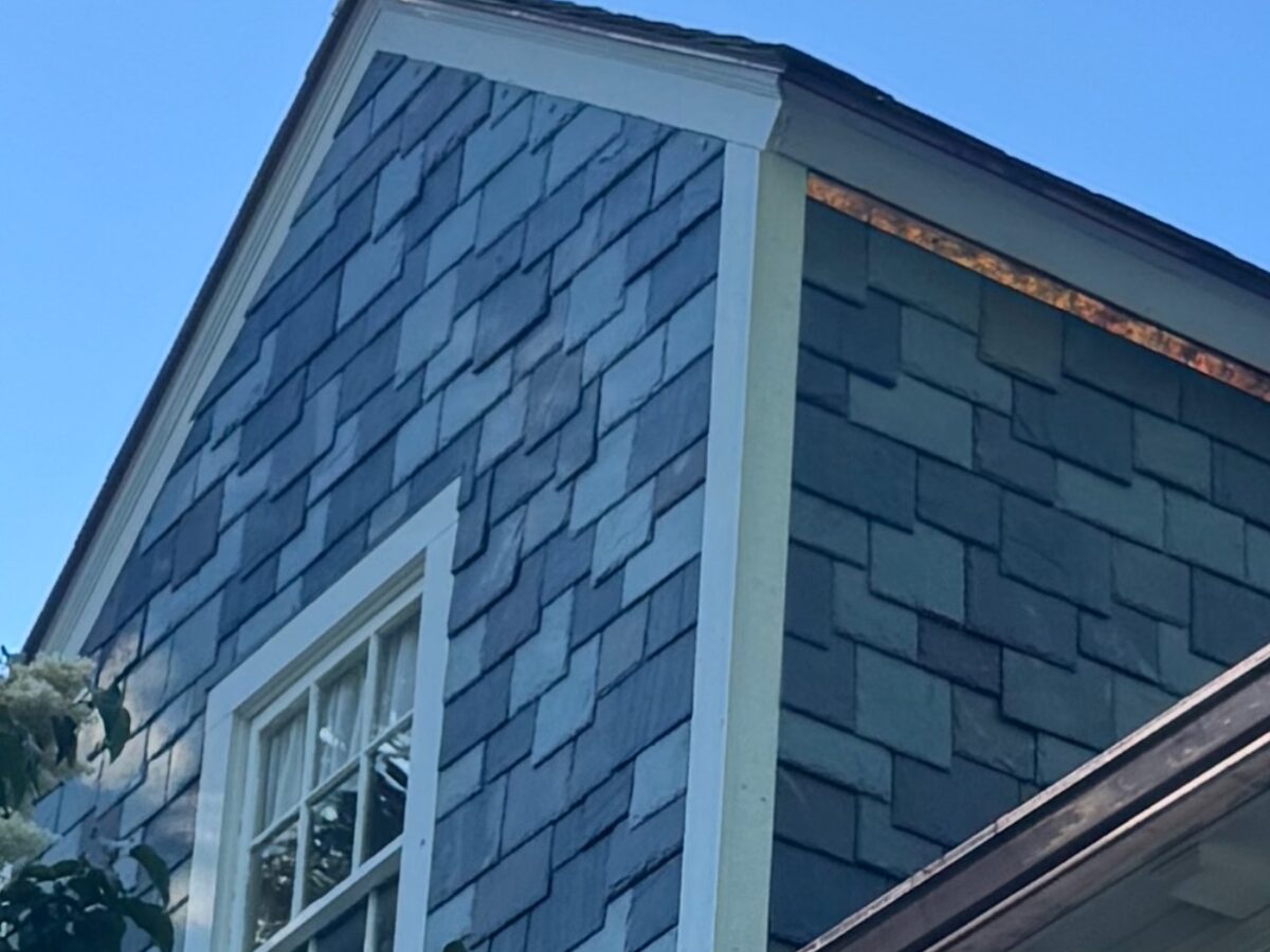 Natural slate dormer with copper flashing